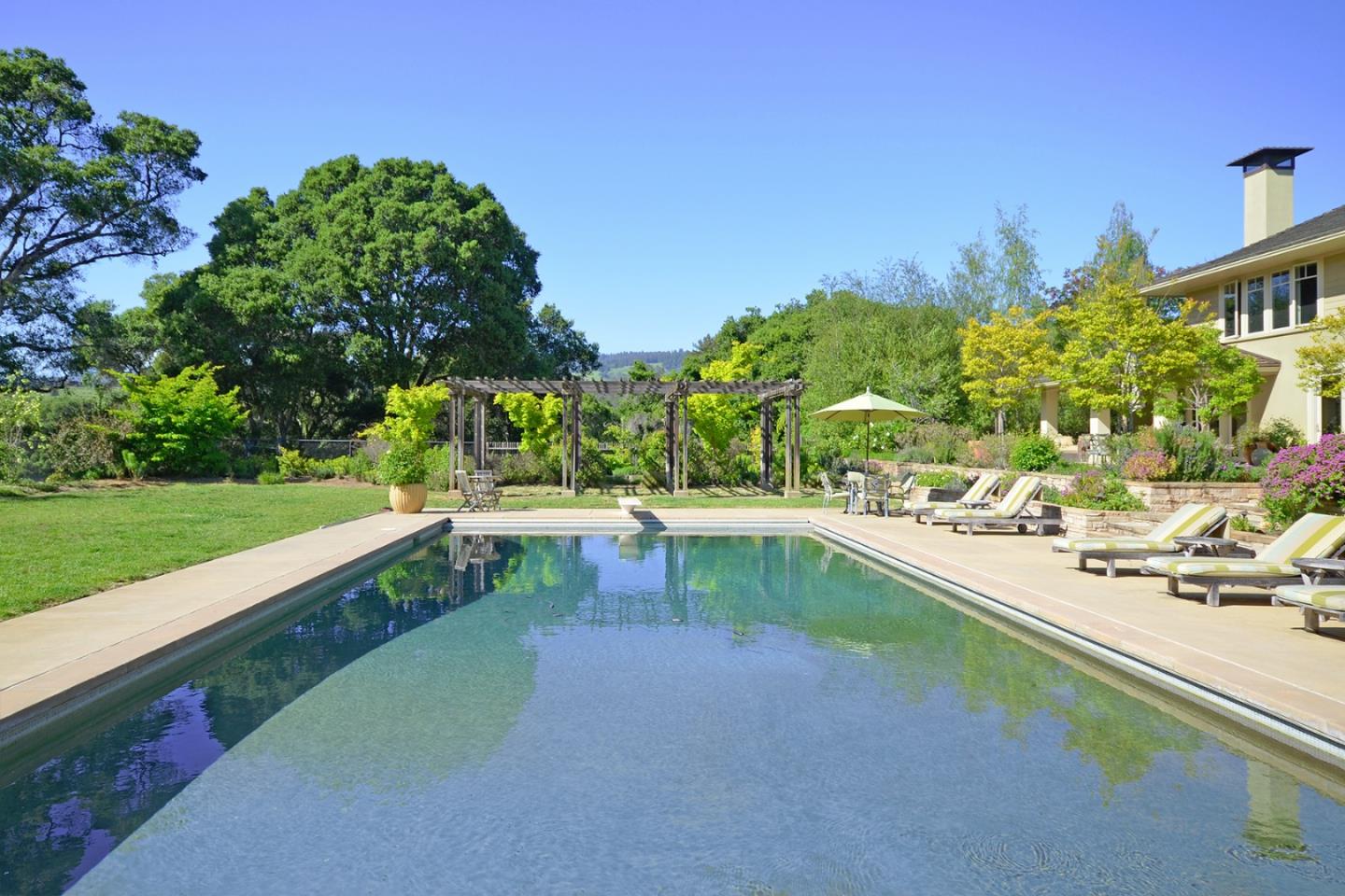 120 Edenvale Road Watsonville, CA 95076 - Photo 26 of 41 a view of a swimming pool with a yard
