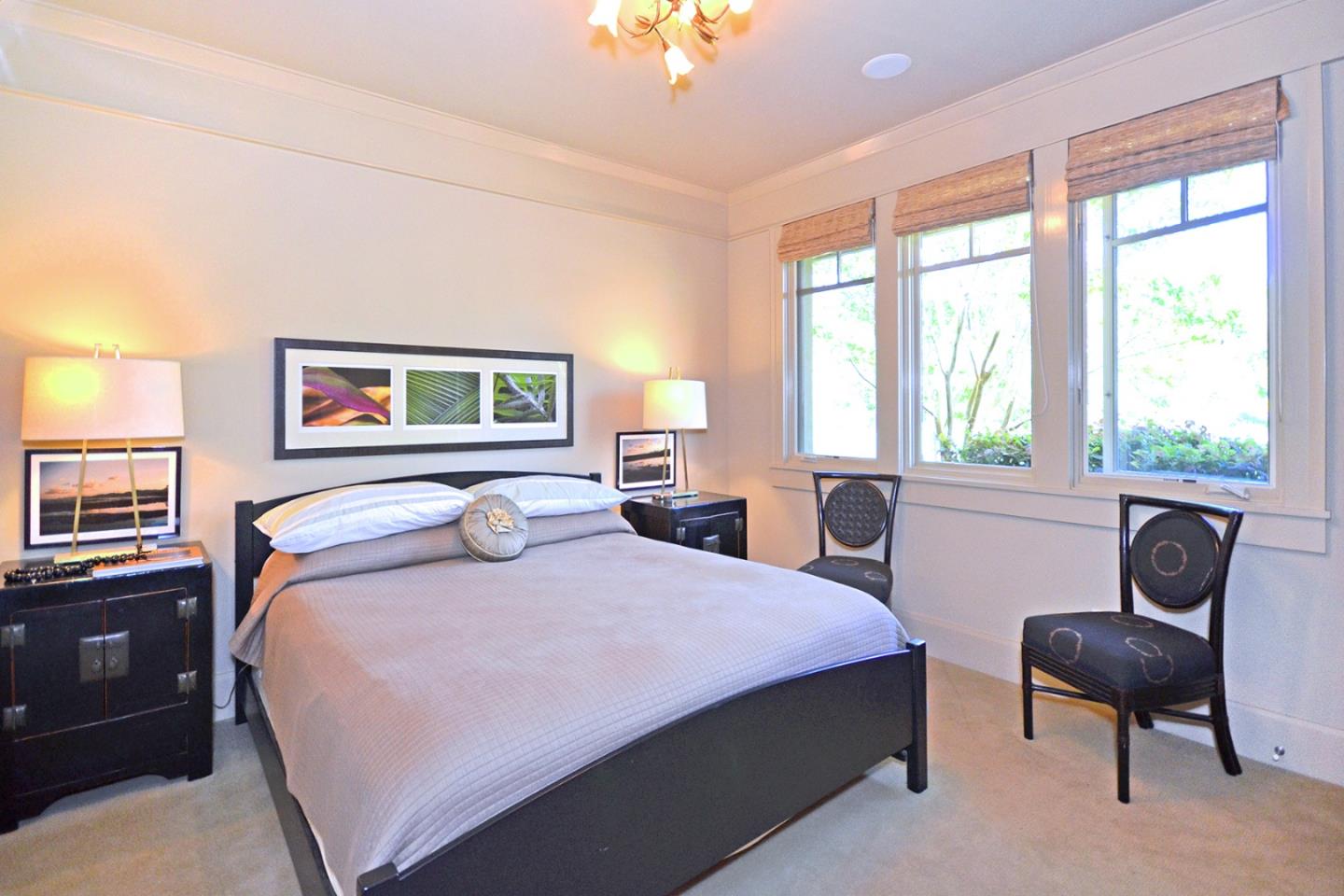 120 Edenvale Road Watsonville, CA 95076 - Photo 10 of 41 a bedroom with a large bed and windows