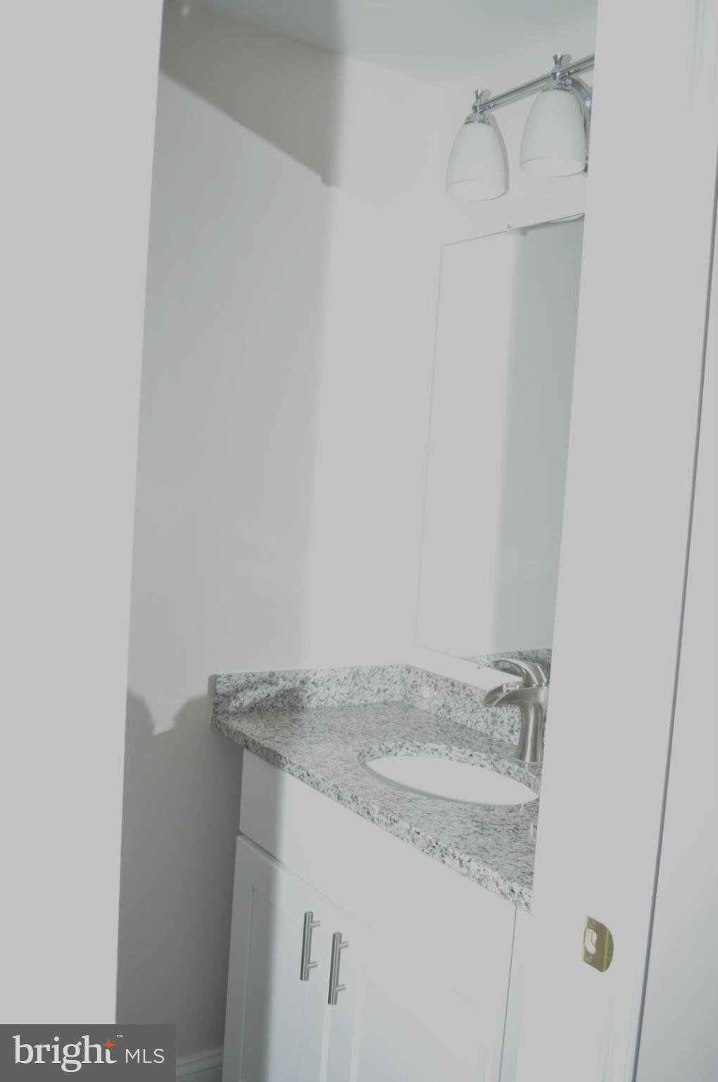 5056 Benning Road Southeast Washington, DC 20019 - Photo 8 of 26 HALF BATH MAIN LVL