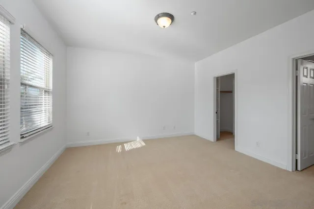 an empty room with windows