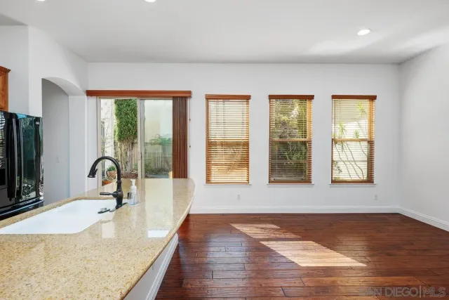 a view of a kitchen from the hallway