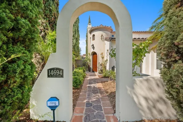 a bathroom with a sink toilet and a mirror