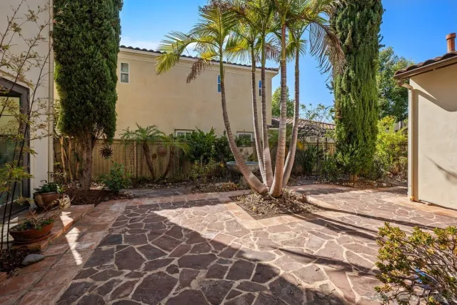 a view of a backyard with a patio