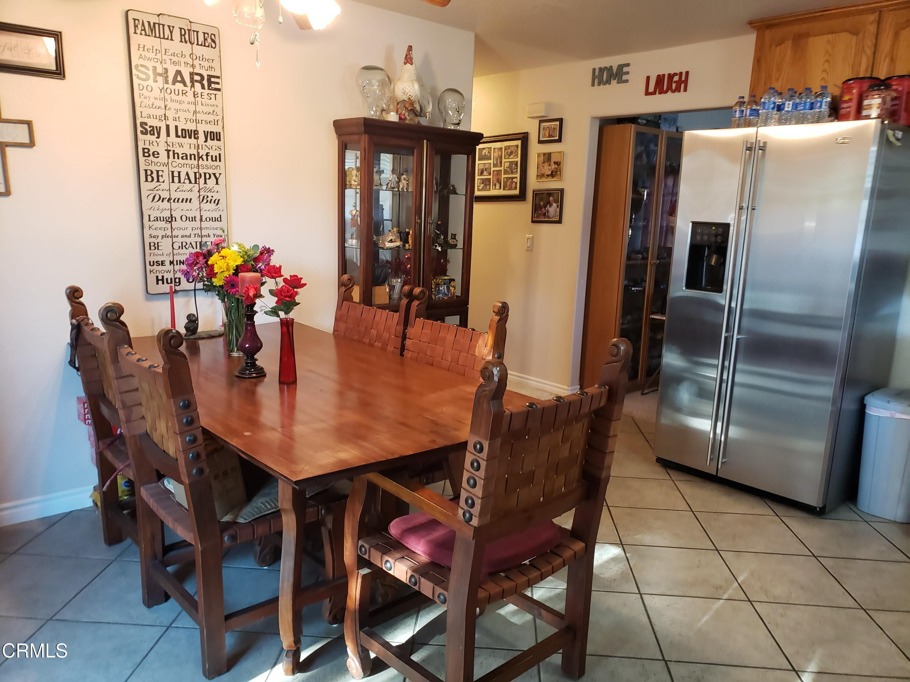 2059 Ralston Street Simi Valley, CA 93063 - Photo 16 of 34 a view of a dining room with furniture