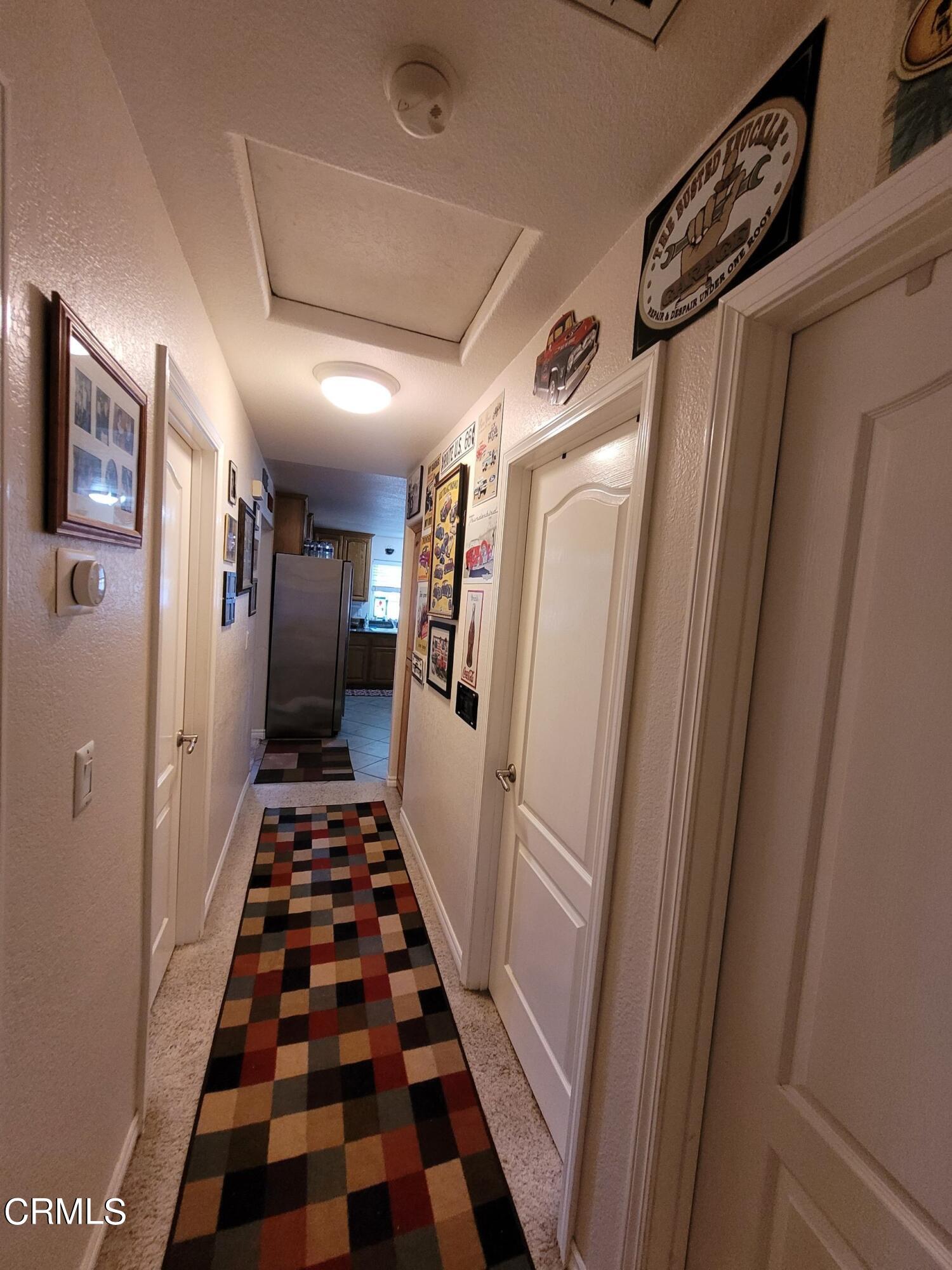 2059 Ralston Street Simi Valley, CA 93063 - Photo 17 of 34 a walk in closet with wooden floor