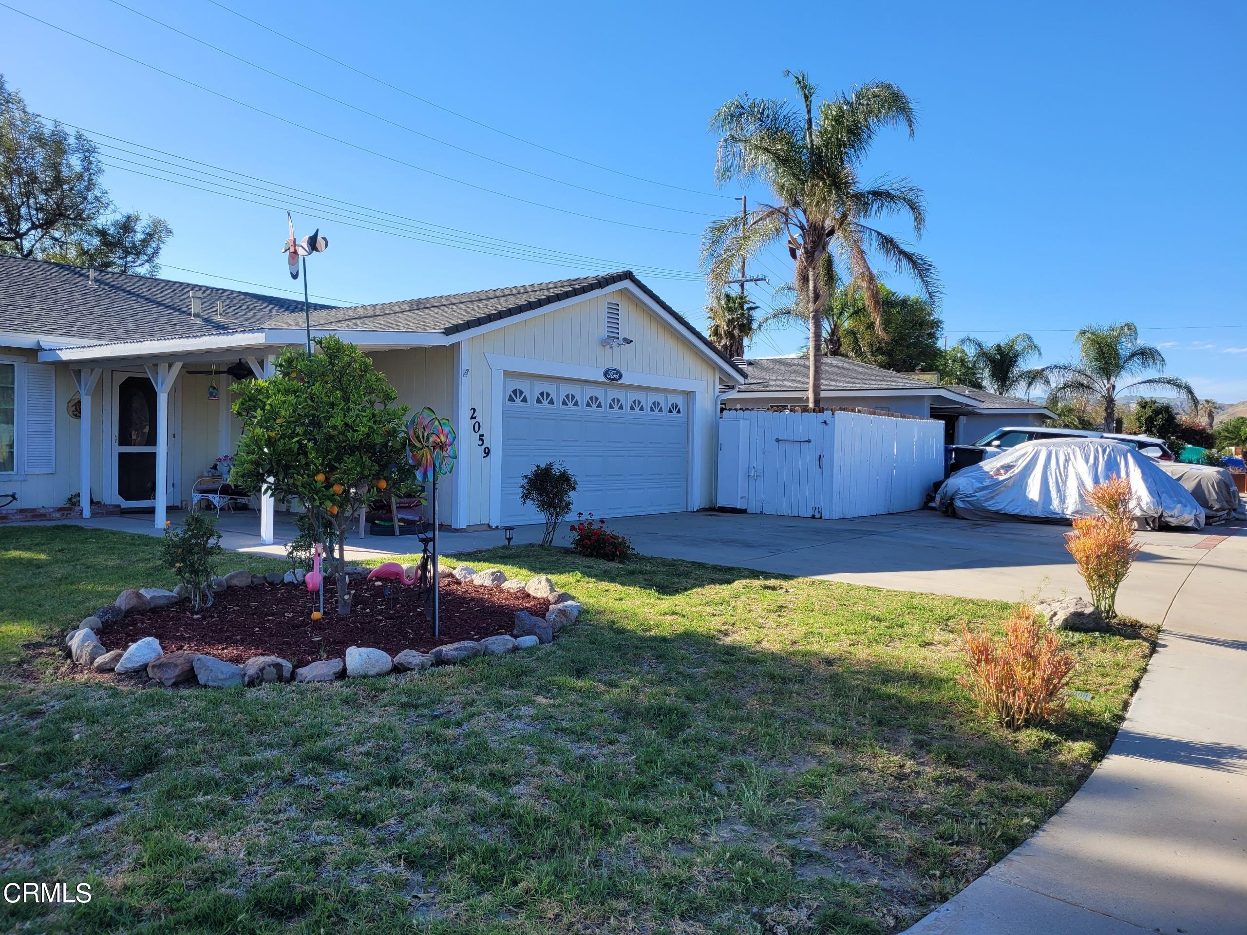 2059 Ralston Street Simi Valley, CA 93063 - Photo 2 of 34 a house view with a garden space
