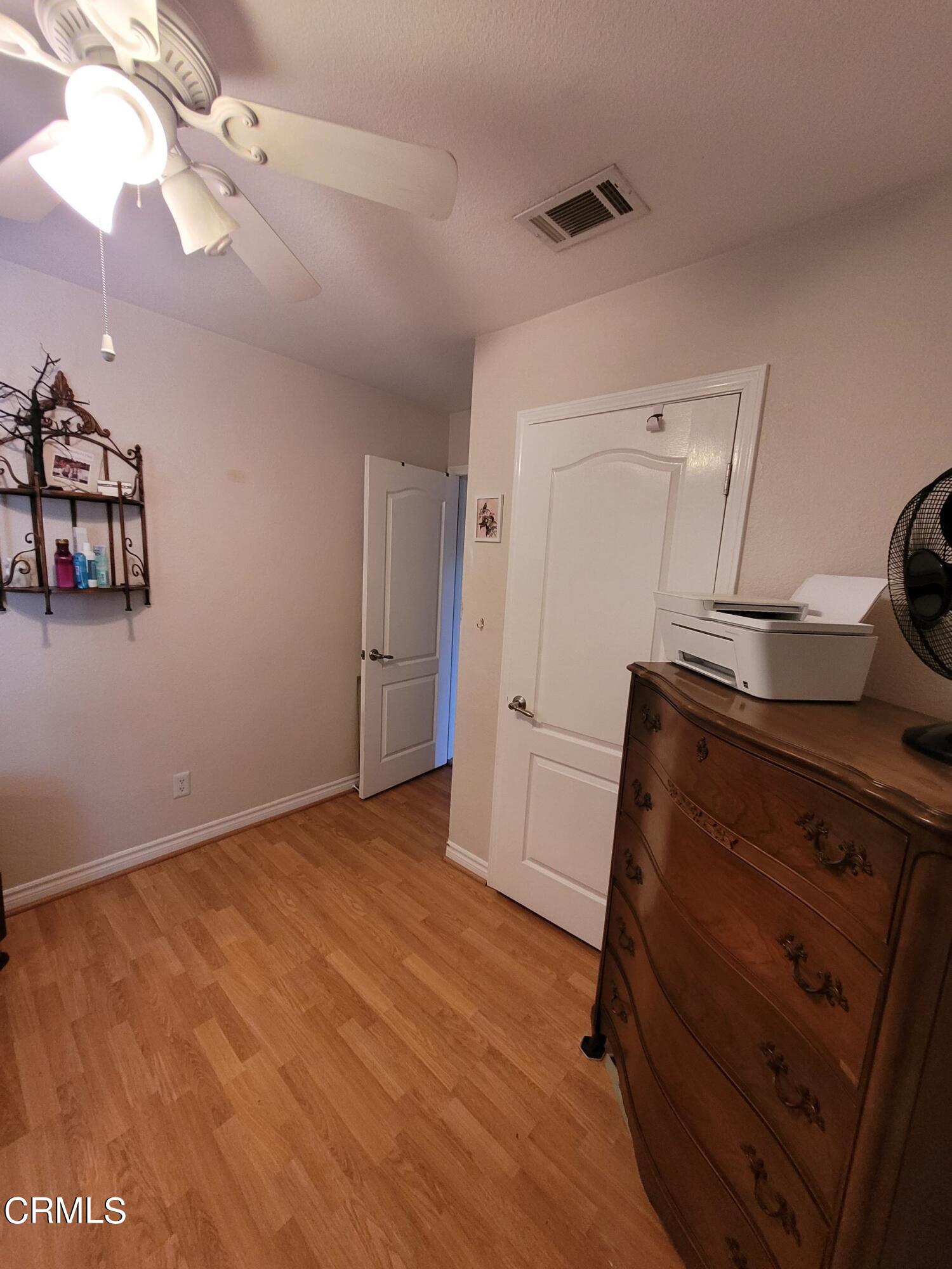 2059 Ralston Street Simi Valley, CA 93063 - Photo 26 of 34 a view of room with window and ceiling fan