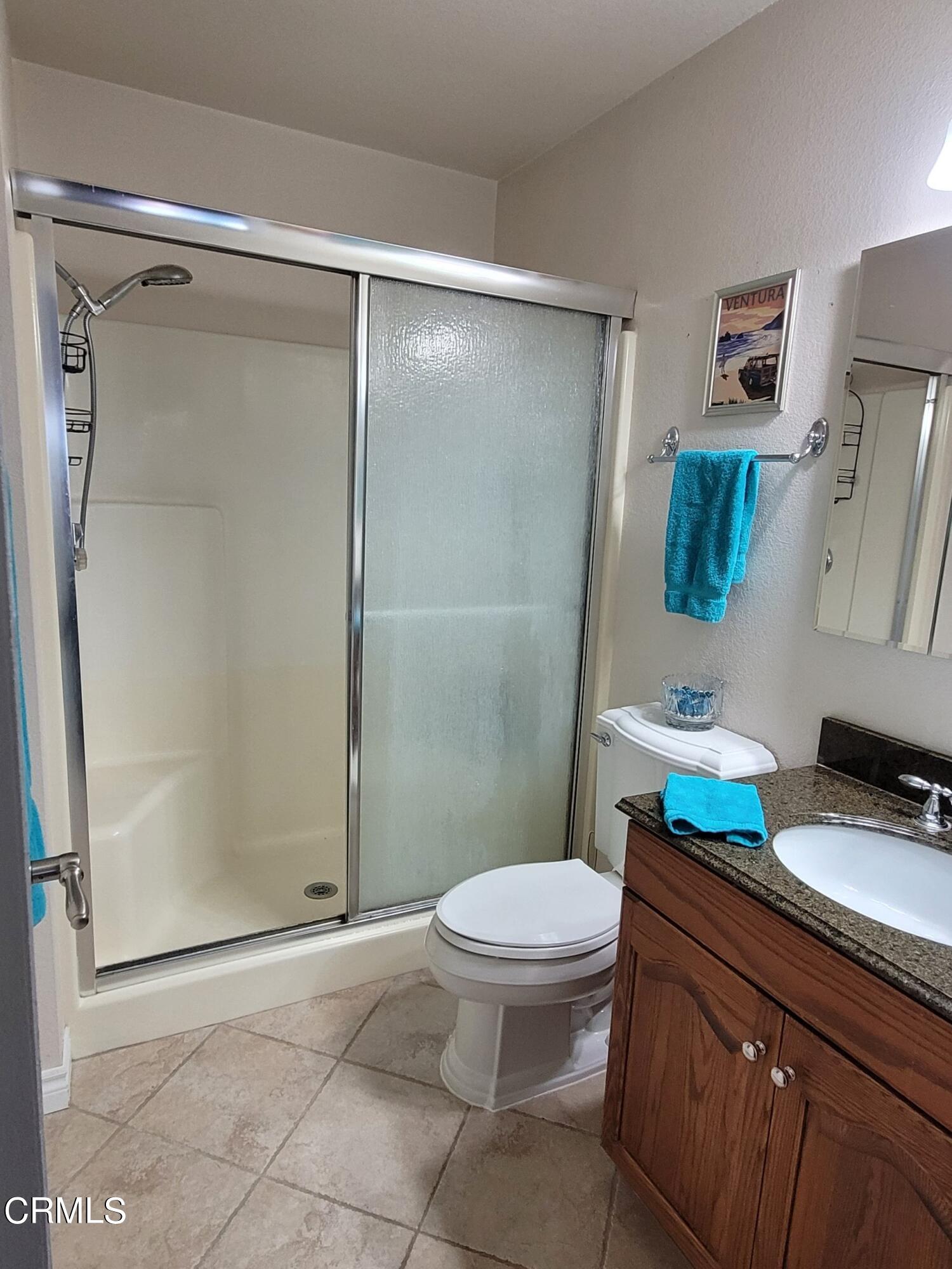 2059 Ralston Street Simi Valley, CA 93063 - Photo 33 of 34 a bathroom with a sink toilet and shower