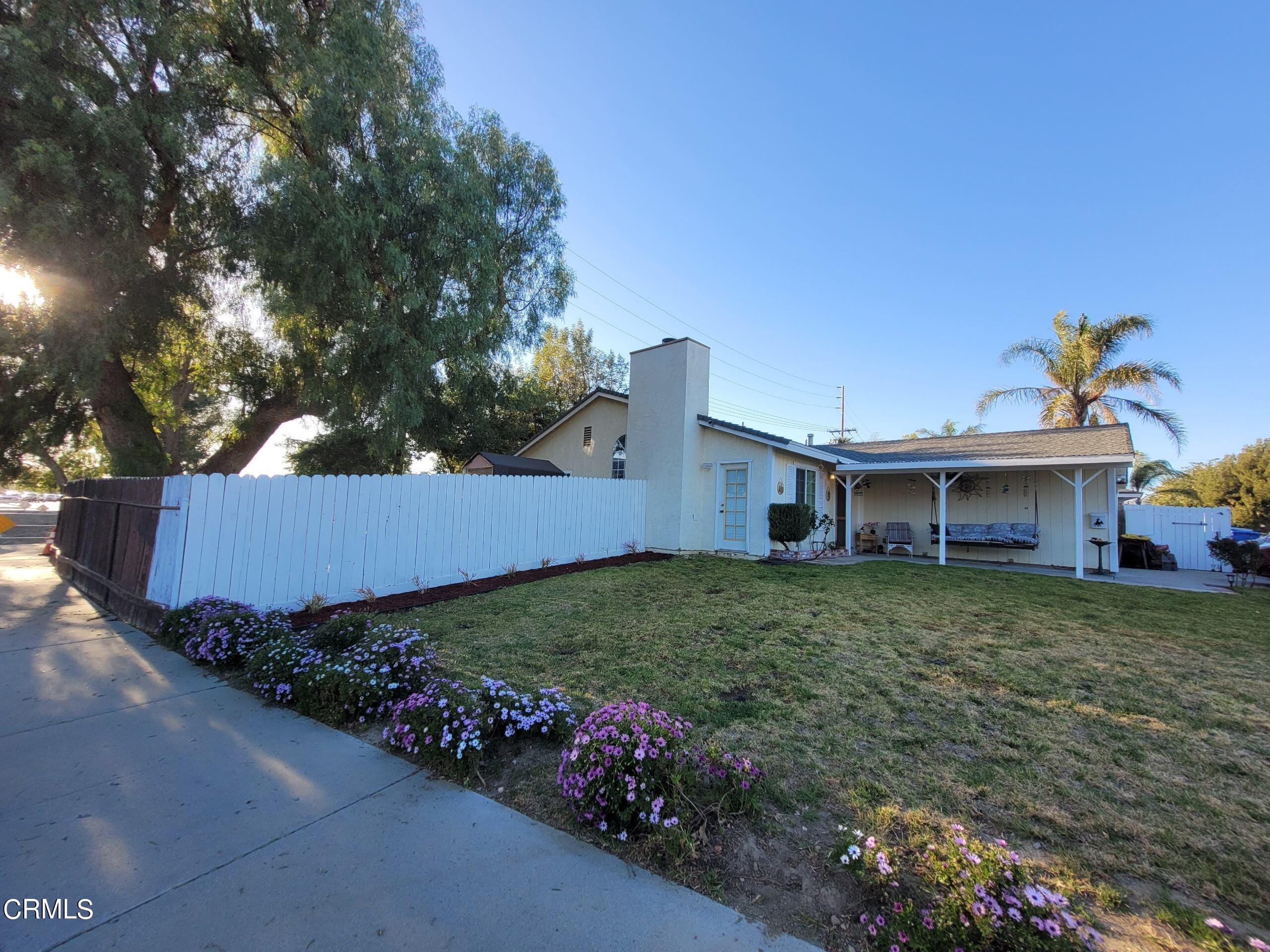 2059 Ralston Street Simi Valley, CA 93063 - Photo 4 of 34 a view of a house with a garden