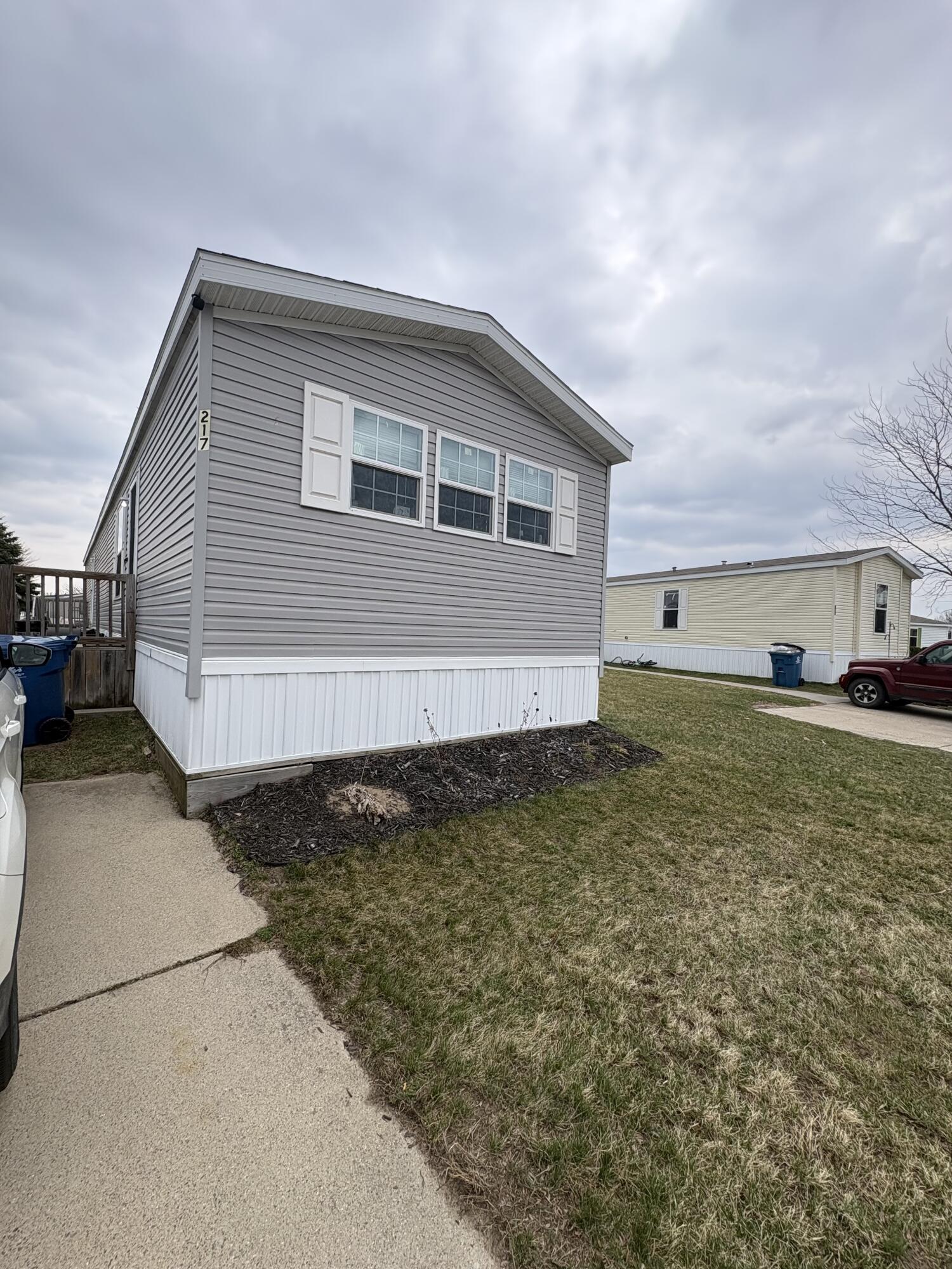 360 East Tuttle Road, Unit 217 Ionia, MI 48846 - Photo 2 of 27 IMG_7296