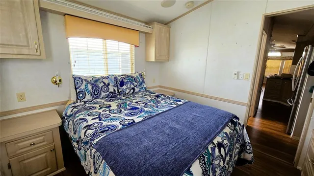 view of a bathroom with a sink a toilet and a shower curtain