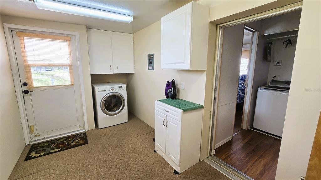 1317 Trout Punta Gorda, FL 33950 - Photo 22 of 55 a view of a kitchen with fridge and wooden floor