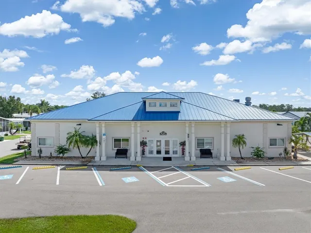 a kitchen with a sink appliances and cabinets