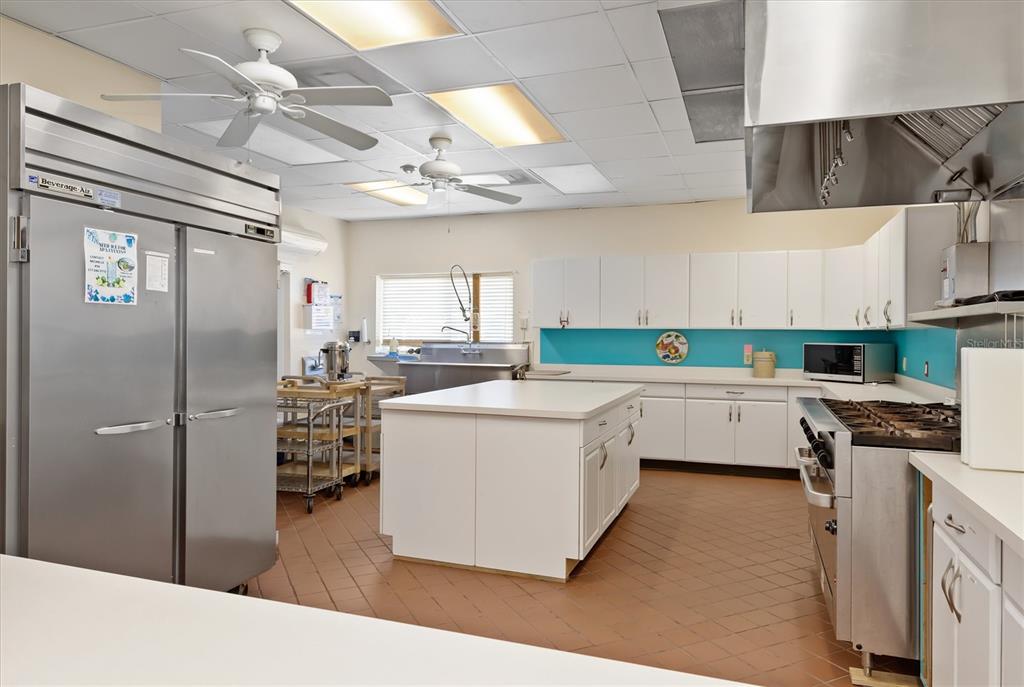 1317 Trout Punta Gorda, FL 33950 - Photo 34 of 55 a kitchen with a sink appliances and cabinets