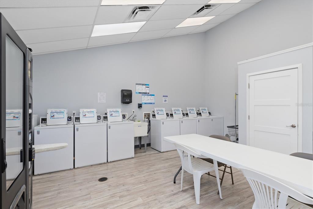1317 Trout Punta Gorda, FL 33950 - Photo 36 of 55 a kitchen with a table chairs and a stove