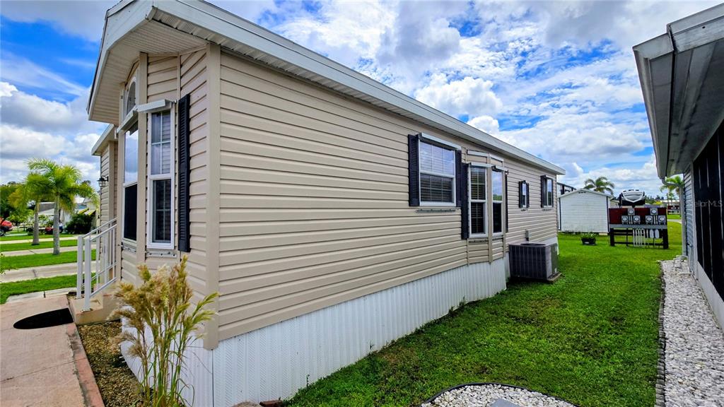 1317 Trout Punta Gorda, FL 33950 - Photo 48 of 55 a view of a house with backyard and a garden