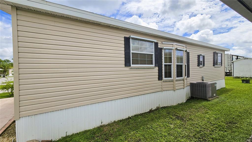 1317 Trout Punta Gorda, FL 33950 - Photo 49 of 55 a view of a house with a yard
