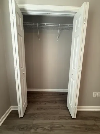 a view of outdoor space with wooden floor