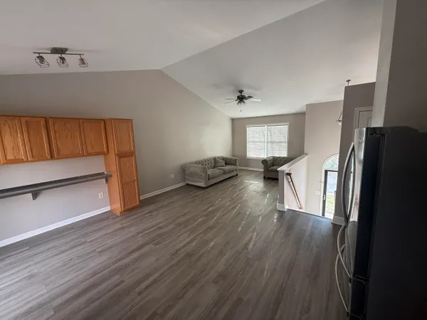 a view of livingroom with furniture and wooden floor