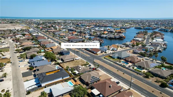an aerial view of a city with lots of residential buildings
