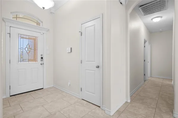 a view of a hallway with closet area