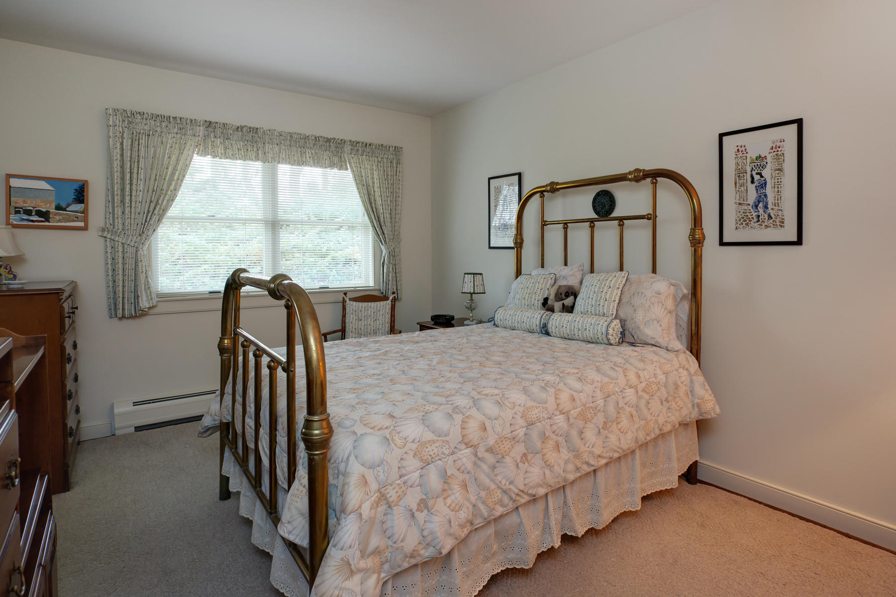 1855 South County Road Osterville, MA 02655 - Photo 12 of 26 a bedroom with a bed next to a window