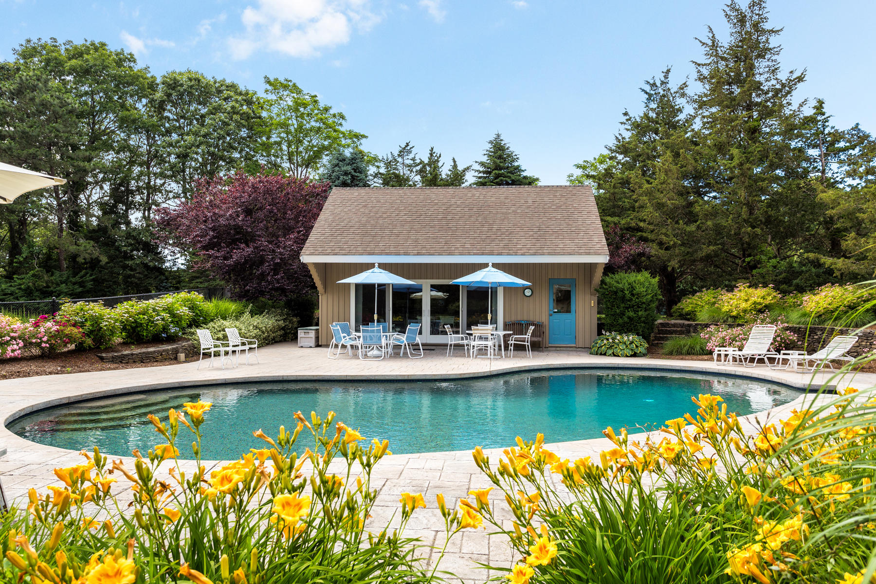1855 South County Road Osterville, MA 02655 - Photo 4 of 26 a view of house with swimming pool and outdoor seating