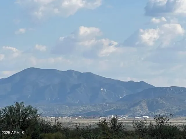 a view of a house with a mountain