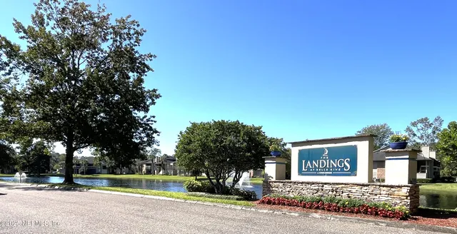 a sign on the side of a road