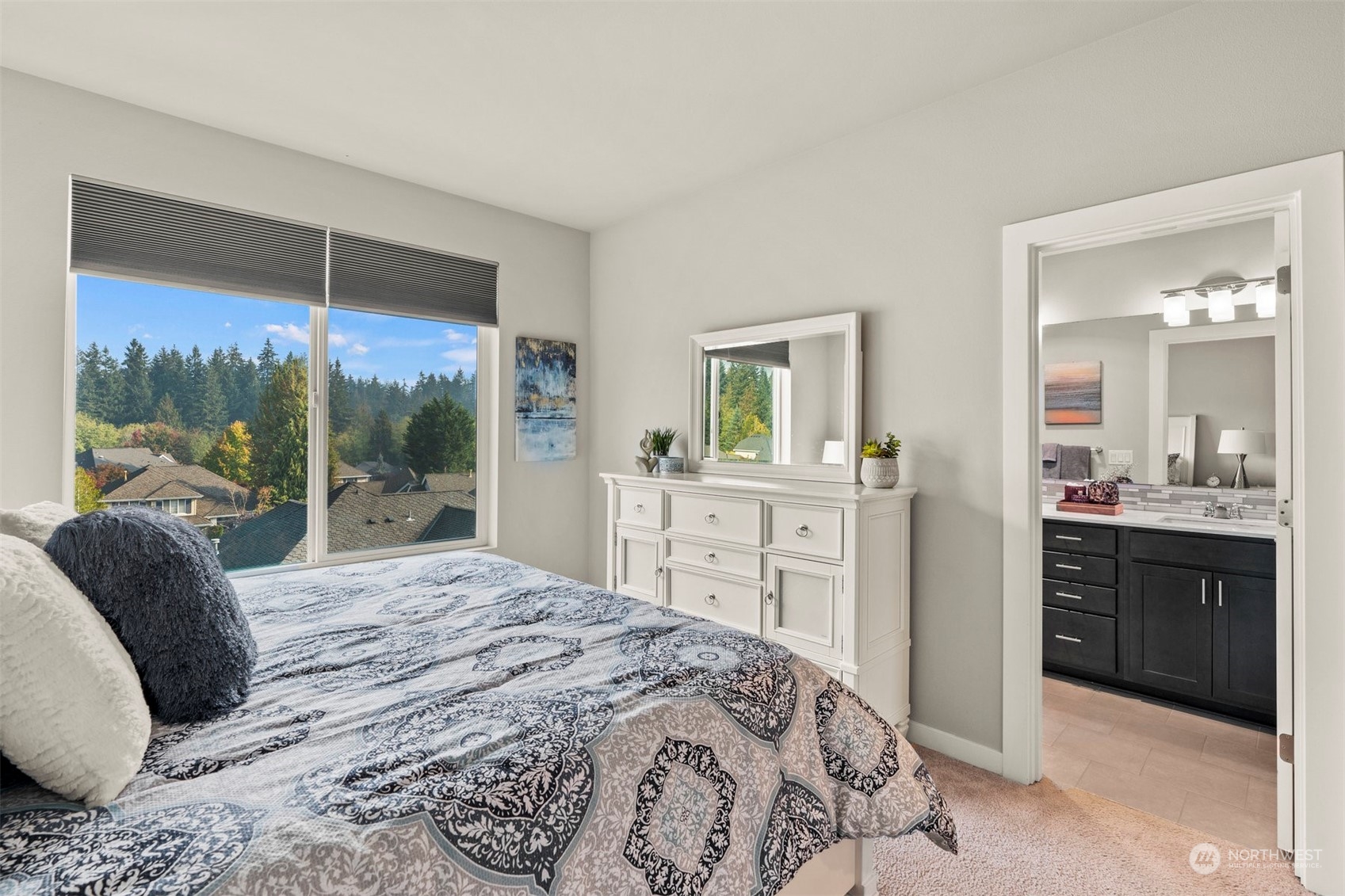 1621 Seattle Hill Road, Unit D3 Bothell, WA 98012 - Photo 11 of 25 a bedroom with a large bed and a view of kitchen