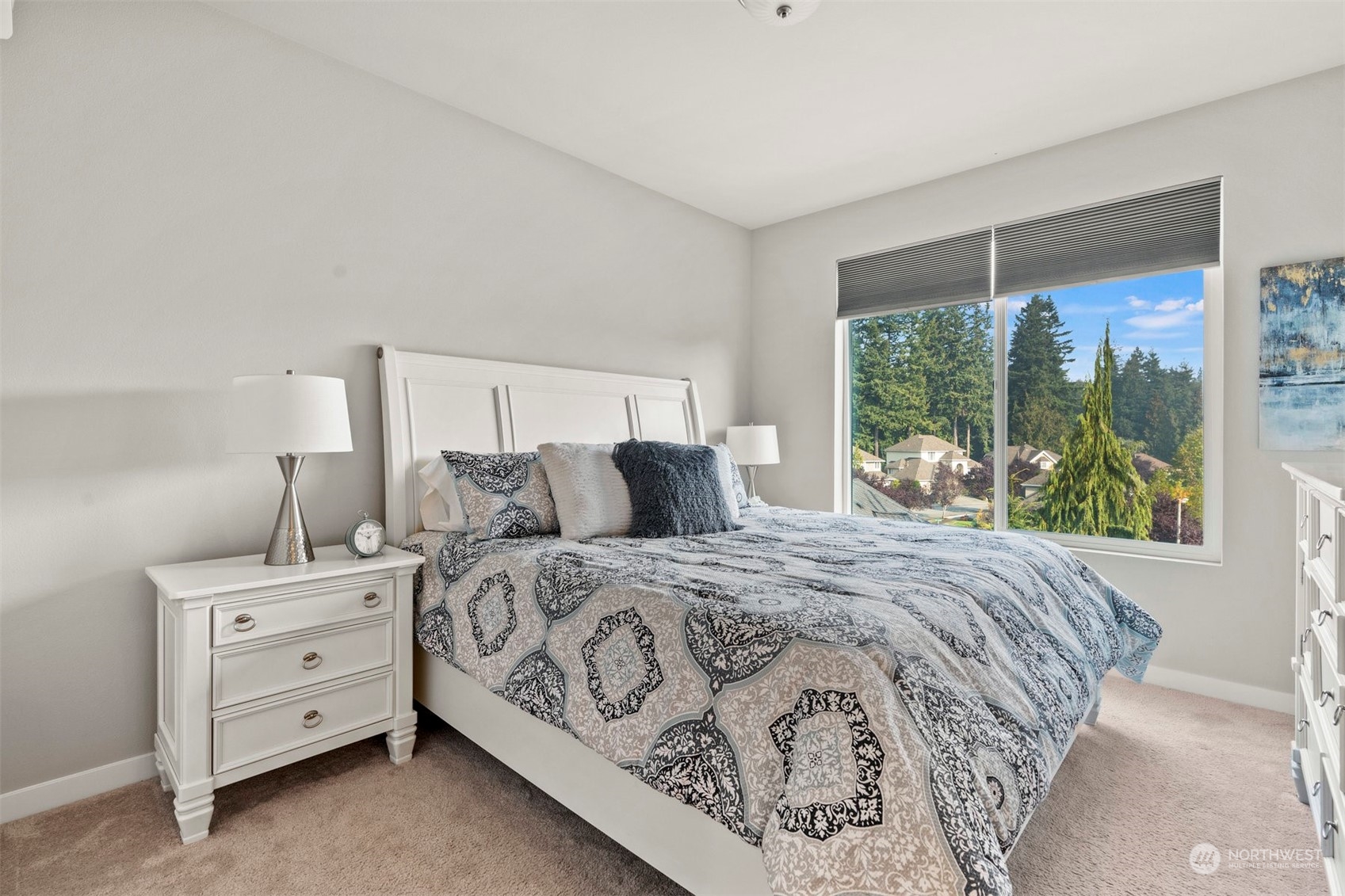 1621 Seattle Hill Road, Unit D3 Bothell, WA 98012 - Photo 12 of 25 a bed sitting in a bedroom next to a window