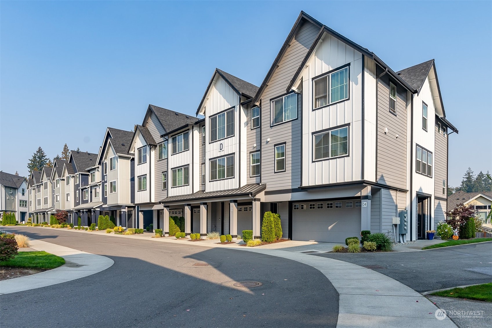 1621 Seattle Hill Road, Unit D3 Bothell, WA 98012 - Photo 24 of 25 a front view of a building with a street