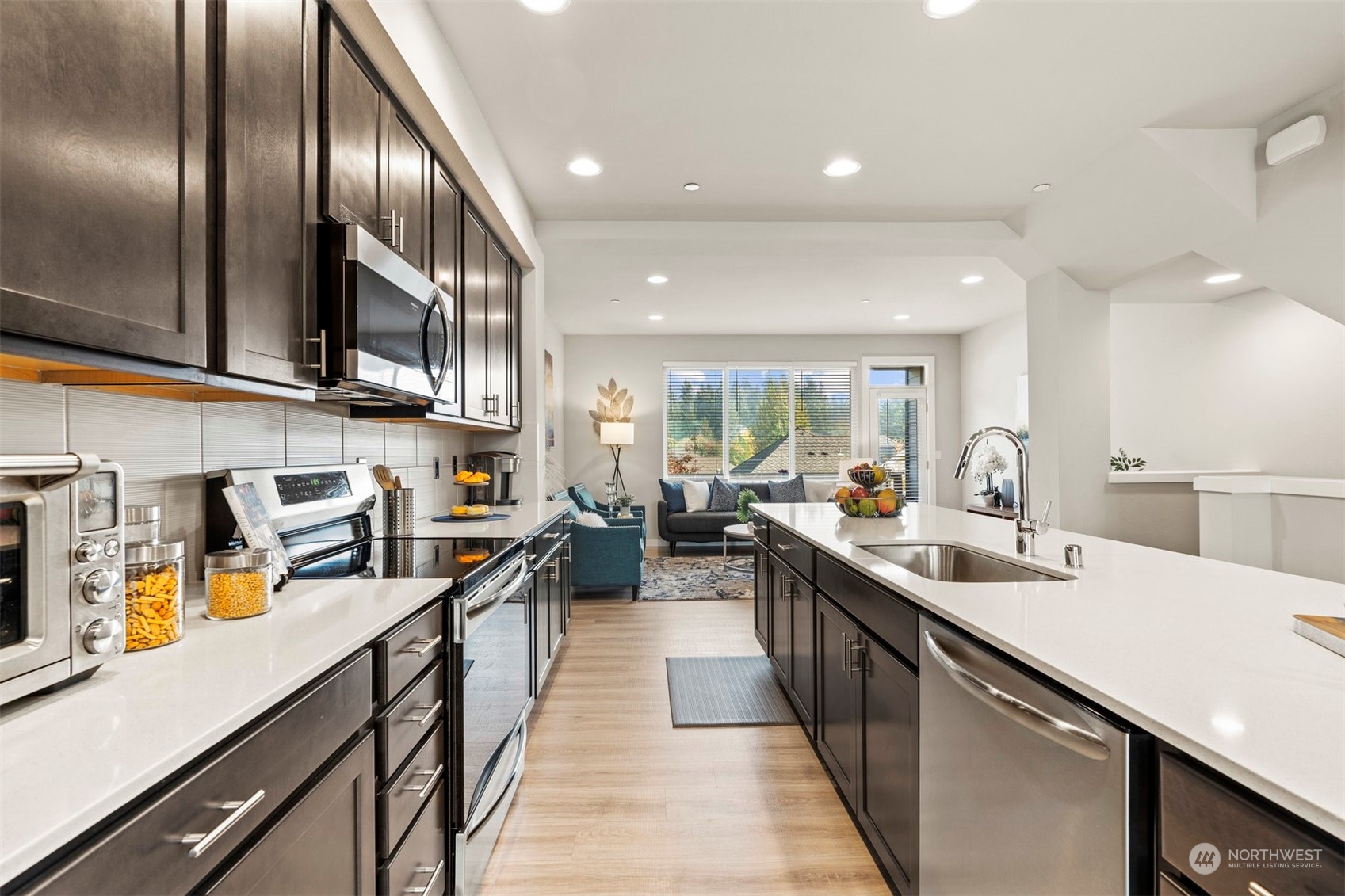 1621 Seattle Hill Road, Unit D3 Bothell, WA 98012 - Photo 3 of 25 a kitchen with lots of counter top space a sink and appliances