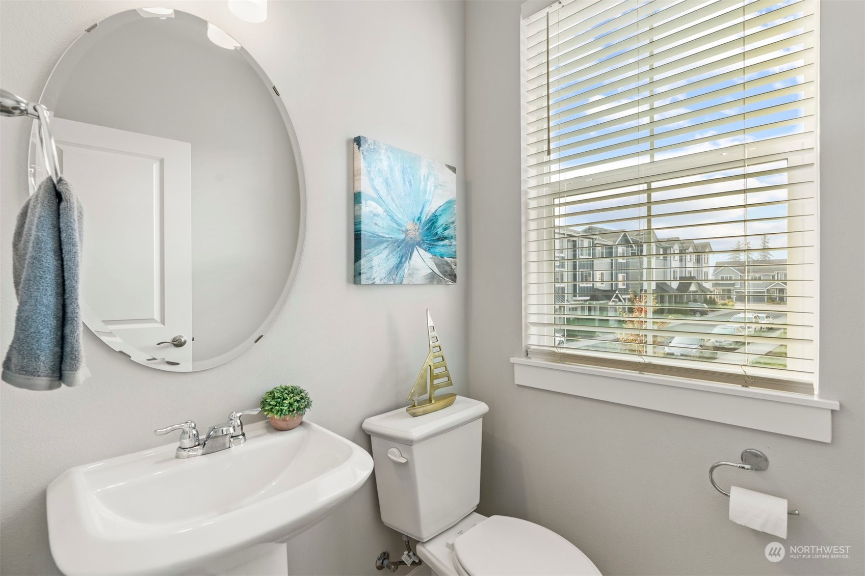 1621 Seattle Hill Road, Unit D3 Bothell, WA 98012 - Photo 9 of 25 a bathroom with a toilet a sink a mirror and a window