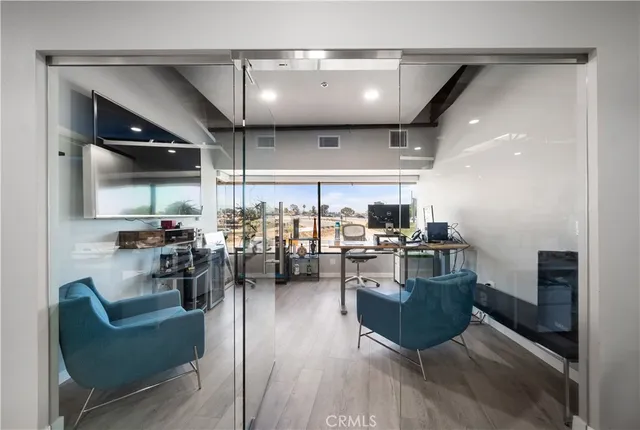 a room with lots of furniture and clutter