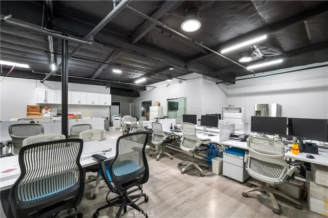 a view of a hallway with workspace