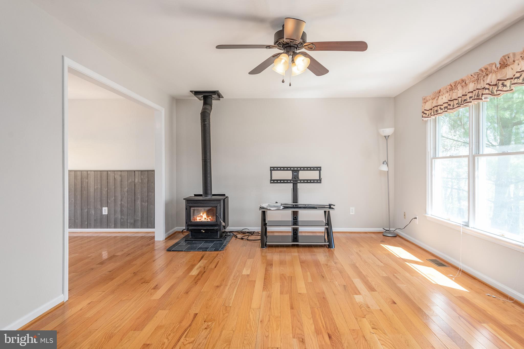 4 Castle Mountain Road Castleton, VA 22716 - Photo 16 of 35 Gleaming Hardwood Floors & Cozy Wood Stove