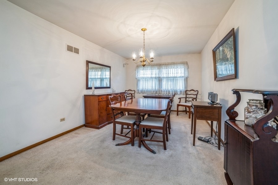 1208 Ridgeway Drive Elgin, IL 60123 - Photo 3 of 10 a view of a dining room with furniture