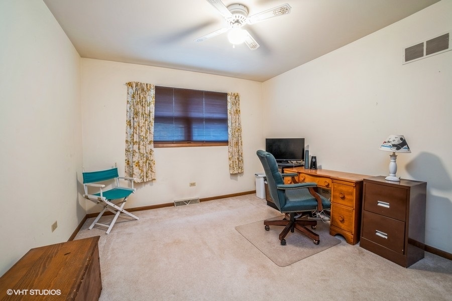 1208 Ridgeway Drive Elgin, IL 60123 - Photo 6 of 10 a workspace with furniture and wooden floor