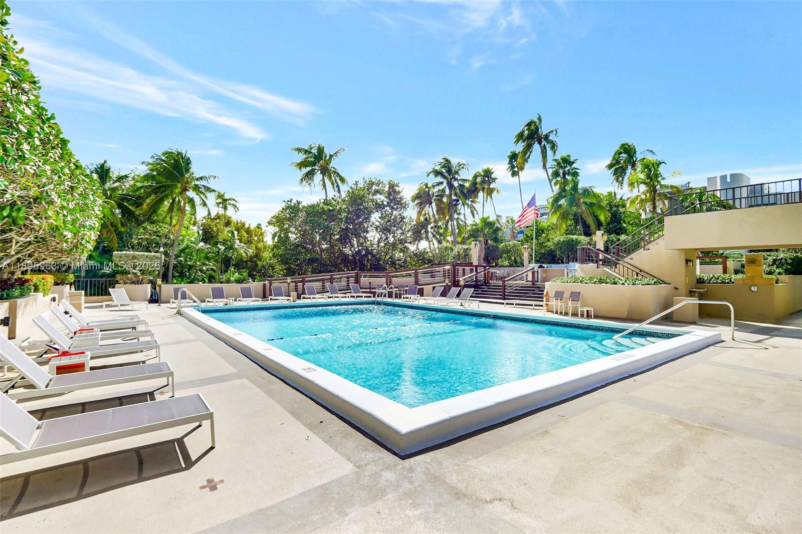 251 Crandon Boulevard, Unit 628 Key Biscayne, FL 33149 - Photo 24 of 32 a view of a swimming pool with a patio