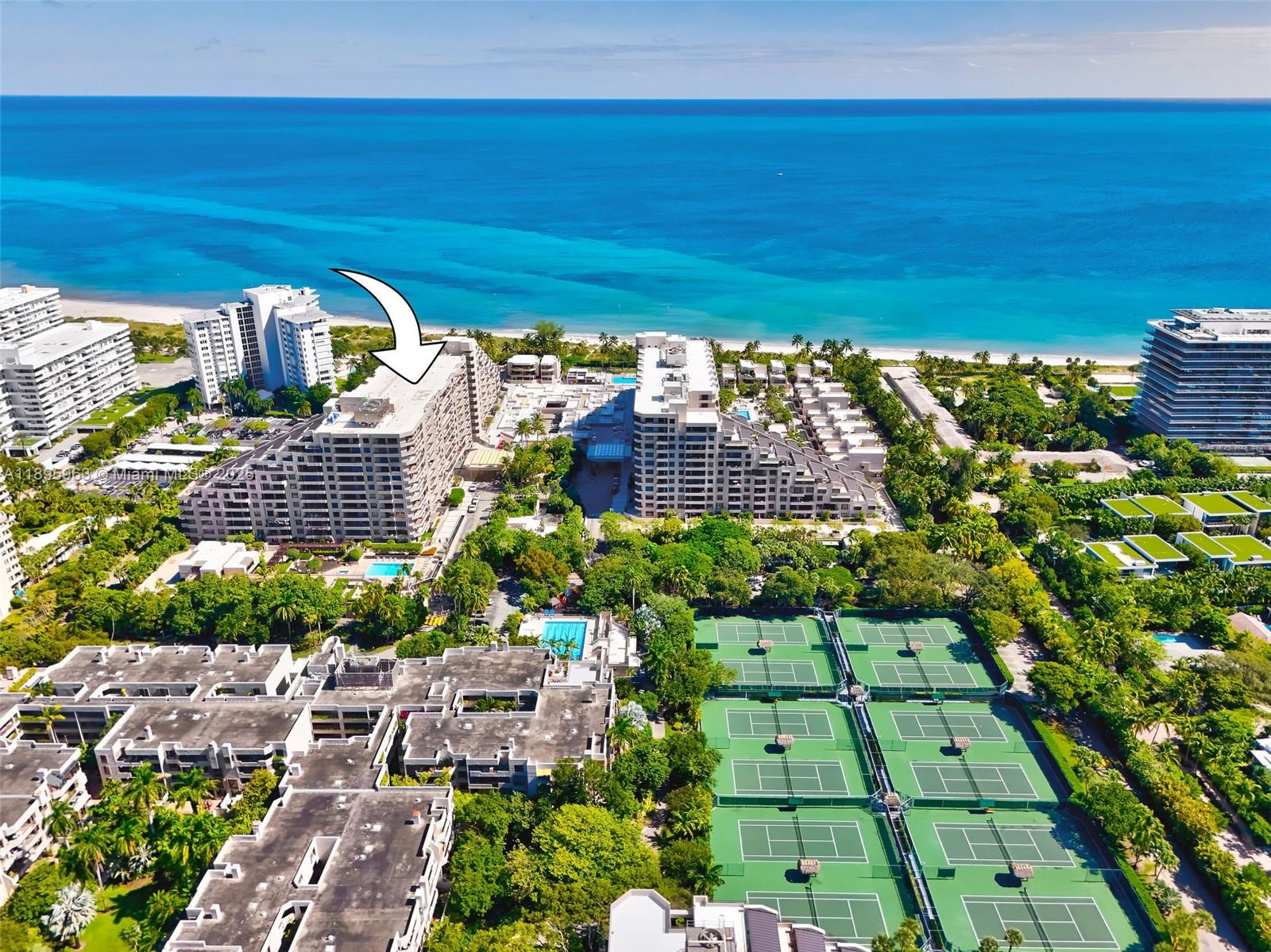 251 Crandon Boulevard, Unit 628 Key Biscayne, FL 33149 - Photo 29 of 32 a view of a balcony with an outdoor space