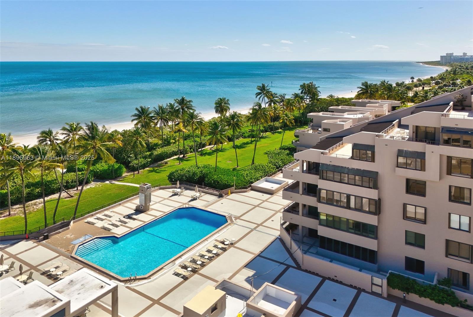 251 Crandon Boulevard, Unit 628 Key Biscayne, FL 33149 - Photo 30 of 32 a view of a city with an ocean view
