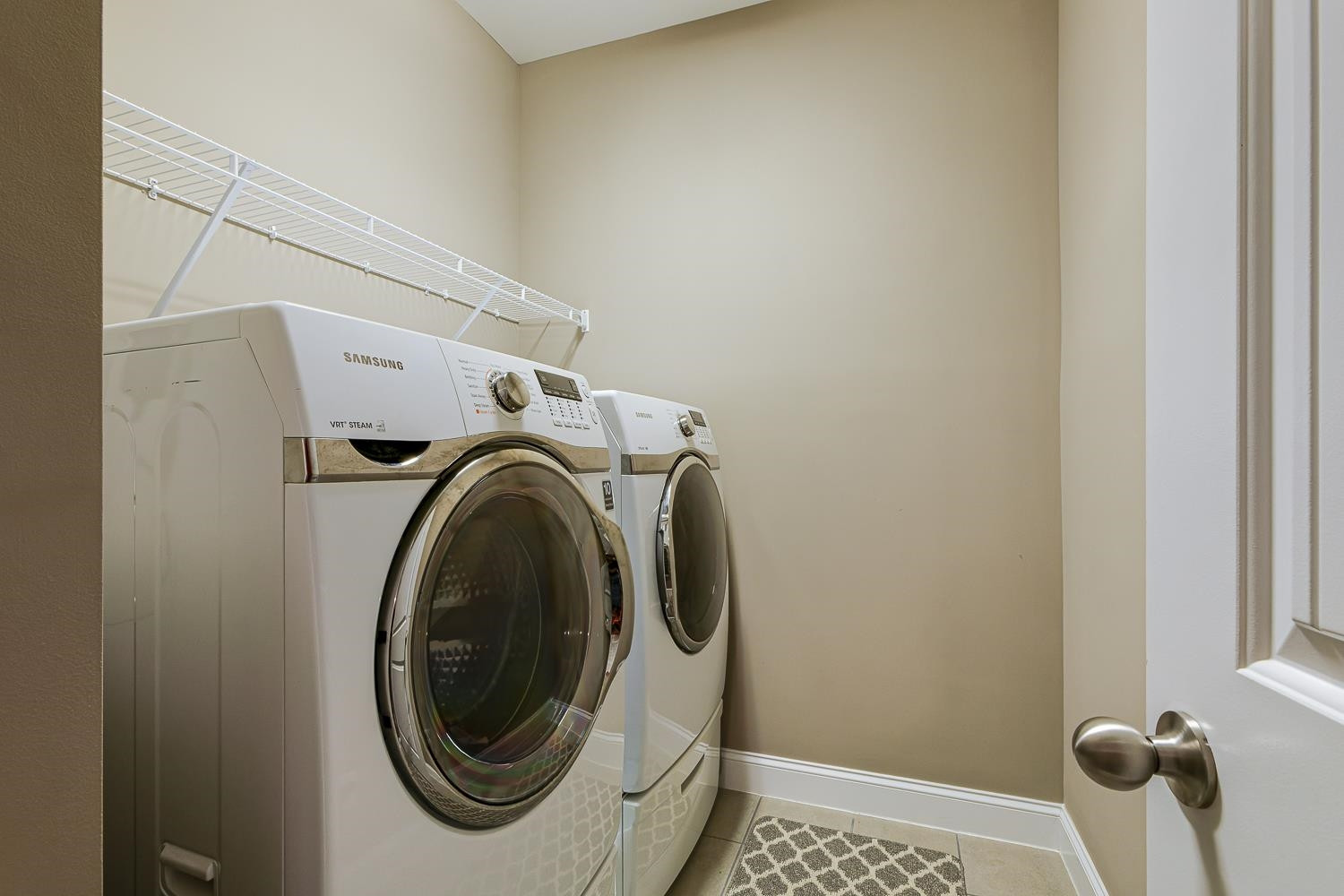5516 Red Line Court Raleigh, NC 27603 - Photo 28 of 39 1st floor laundry room / washer and dryer convey