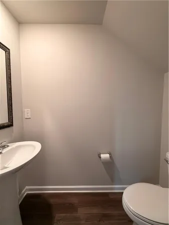 a view of a livingroom with a fireplace and a workspace