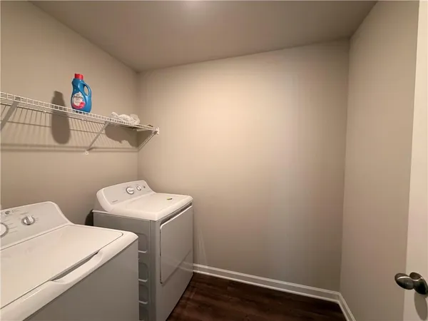 a room with a bed and window