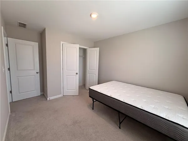 a room with a bed and a table