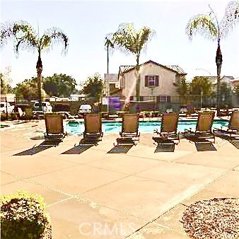 4473 Bigem Court Riverside, CA 92501 - Photo 2 of 18 a view of a patio with a table and chairs