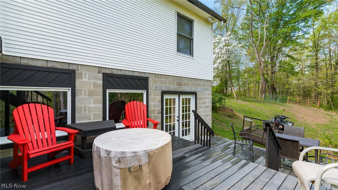 2531 Nicholas Lane Dresden, OH 43821 - Photo 33 of 40 Exterior deck featuring black railings and composite decking