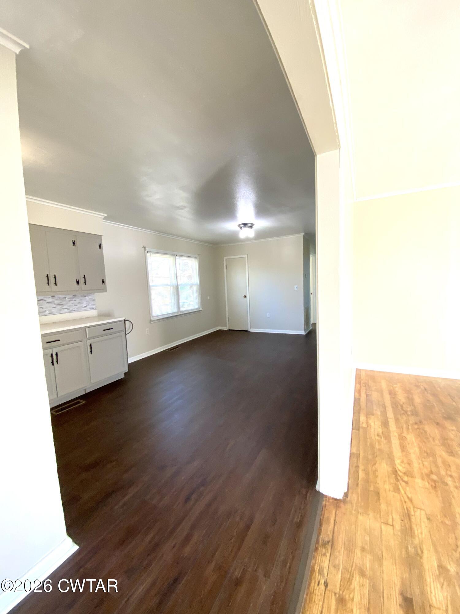 20 South Garland Street McKenzie, TN 38201 - Photo 9 of 18 a view of hallway with wooden floor