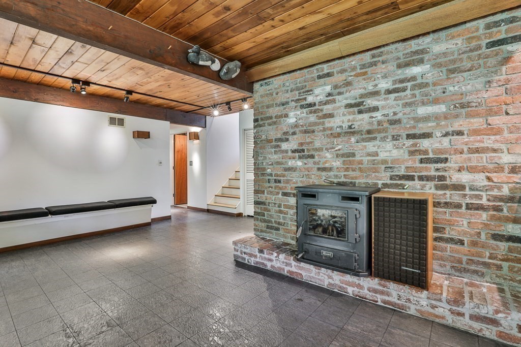 62 Woodside Road Harvard, MA 01451 - Photo 28 of 36 a room with fireplace